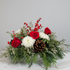 Holiday arrangement on round marble table